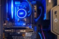 Open pc system unit with ice blue light liquid cooling - Moscow, Russia, December 23, 2020