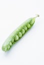 Open pea pod containing peas close-up Royalty Free Stock Photo