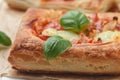 Open pies puff pastry with tomato, mozzarella, onion and Basil Royalty Free Stock Photo