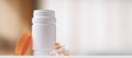 Open pill bottle and capsules Royalty Free Stock Photo