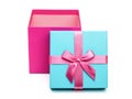 Open pink box with a gift and bow isolated Royalty Free Stock Photo