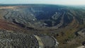 Open pit coal mine, extractive industry for coal, top view aerial drone