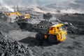 Open pit mine industry, big yellow mining truck for coal anthracite Royalty Free Stock Photo