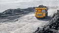 Open pit mine industry, big yellow mining truck for coal anthracite Royalty Free Stock Photo