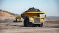 Open pit mine industry, big yellow mining truck for coal anthracite Royalty Free Stock Photo