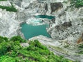 Open pit mine industry. Limestone quarry. Mining industry and construction material supply. Landscape of resource extraction in a Royalty Free Stock Photo