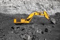 Open pit mine industry work of large yellow excavator for loading and coal mining Royalty Free Stock Photo