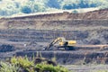 Open-pit mining for lignite that is burnt and transformed to electricity by the power station Royalty Free Stock Photo