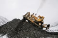 Bulldozer in the mountains of Eastern Siberia / Excavation / Mining Royalty Free Stock Photo