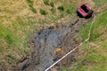 An open pit with slopes and off-road terrain for competition driving through the swamp.