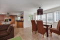 Open plan modern family kitchen room with dining table