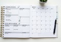 Right page features a monthly calendar with blank spaces for dates Royalty Free Stock Photo