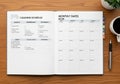 Open planner on a wooden table includes a Cleaning Schedule on the Royalty Free Stock Photo
