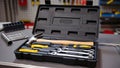 Open plastic tool case with hand tools in workshop â AI content Royalty Free Stock Photo