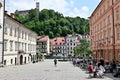 Open Plaza With Outdoor Dining and Fountain With Ljubljana Castle in Background