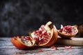 Open pomegranate fruit on a table Royalty Free Stock Photo