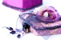 Open purple gift box with a rose isolated. Royalty Free Stock Photo
