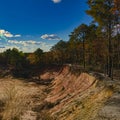 open quarry side exposing the marl clay below the surface