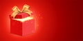 Open red gift box with golden ribbon and magical glitter light, shining from inside. Holiday gift vector banner design. Royalty Free Stock Photo