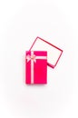 Open red gift box with ribbon bow Royalty Free Stock Photo