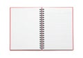 Open red notebook with blank lined pages ready for writing or drawing Royalty Free Stock Photo