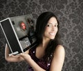 Open reel tape recorder beautiful brunette Dj Royalty Free Stock Photo