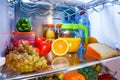 Open refrigerator filled with food Royalty Free Stock Photo