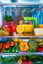 Open refrigerator filled with food Royalty Free Stock Photo