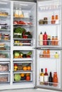Open refrigerator full of fresh products Royalty Free Stock Photo