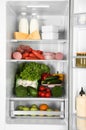 Open refrigerator full of fresh products Royalty Free Stock Photo