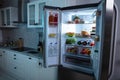 An Open Refrigerator Full Of Healthy Foods