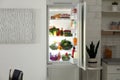 Open refrigerator full of products Royalty Free Stock Photo