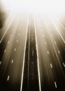 Empty Highway Disappearing into Fog Royalty Free Stock Photo