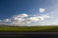 Open road with clouds Royalty Free Stock Photo