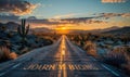 The open road through a desert at sunset with JOURNEY BEGINS written across the path, symbolizing new adventures and the start of Royalty Free Stock Photo