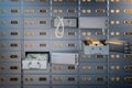 Open safe deposit box with money, jewels and golden ingots. Financial banking investment concept Royalty Free Stock Photo