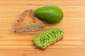 Open sandwich with guacamole, avocado and brown sprouted bread Royalty Free Stock Photo