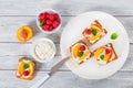 Open sandwich: mascarpone cheese, raspberry, peach slices