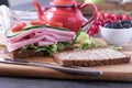 Open sandwich on a wooden board Royalty Free Stock Photo