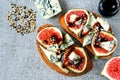 Open sandwiches with figs and blue cheese. Royalty Free Stock Photo