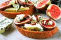 Open sandwiches with figs and blue cheese. Royalty Free Stock Photo