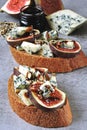 Open sandwiches with figs and blue cheese. Royalty Free Stock Photo