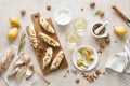 Open sandwiches with ricotta cheese, fresh pears, walnuts and honey on breakfast table, overhead view Royalty Free Stock Photo