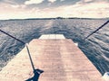 Open side ramp on small car and passenger ferry boat on lake Royalty Free Stock Photo