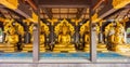 Open-sided wooden pavilion of five Buddha image statues at Wat Phra That Doi Phra Chan