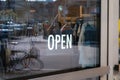 We are open sign on shop door - store window with open sign Royalty Free Stock Photo