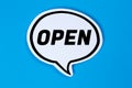Open sign shop store cafe restaurant speech bubble communication concept Royalty Free Stock Photo