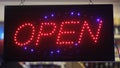 Open sign in front of shop