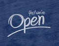 Open sign text over blue background Royalty Free Stock Photo