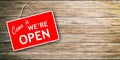 We are open sign on wooden background Royalty Free Stock Photo